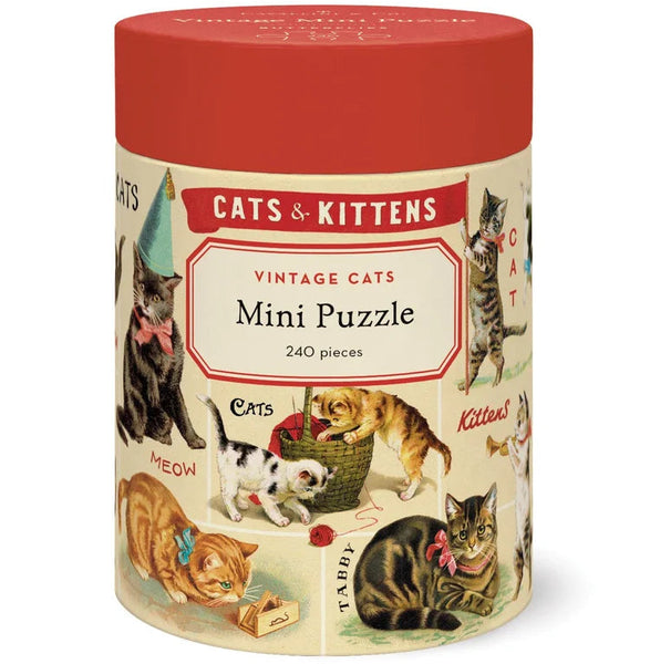 A cylindrical container holds the Vintage 240 Piece Puzzle, featuring vintage-style illustrations of playful cats and kittens—a charming gift for any puzzle lover.