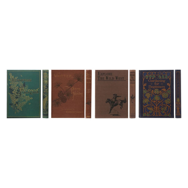 Six vintage hardcover books with decorative botanical and western covers stand upright against a white background, offering the perfect inspiration for your Canvas Journal, available in 4 styles.